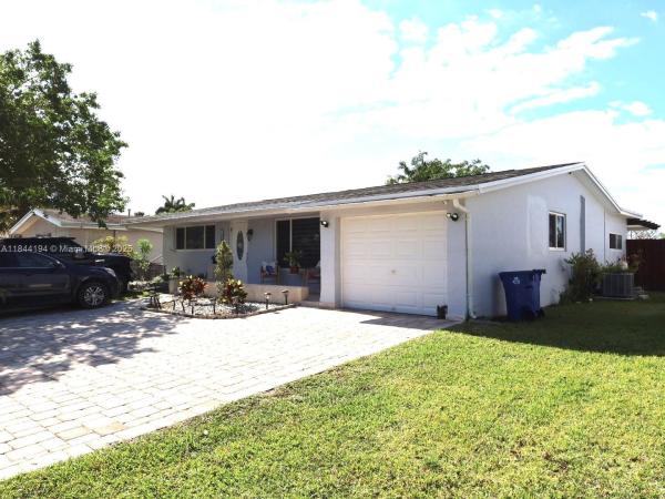 Sunrise Golf Village, 9170 NW 24th Pl, Sunrise, Florida 33322, image 1