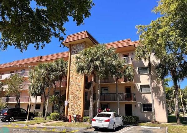 Lakes Of Carriage Hills, 4940 E Sabal Palm Blvd #205, Tamarac, Florida 33319, image 1