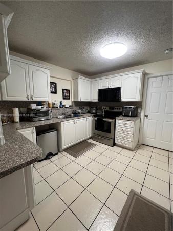 Woodland Terrace, 5070 Ponderosa Ln #5070, Haverhill, Florida 33415, image 1