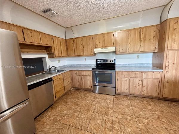 Hamptons Townhomes, 1399 Sussex Dr, North Lauderdale, Florida 33068, image 1