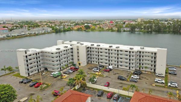 Vista Del Lago, 9917 W Okeechobee Rd #3-303, Hialeah Gardens, Florida 33016, image 1