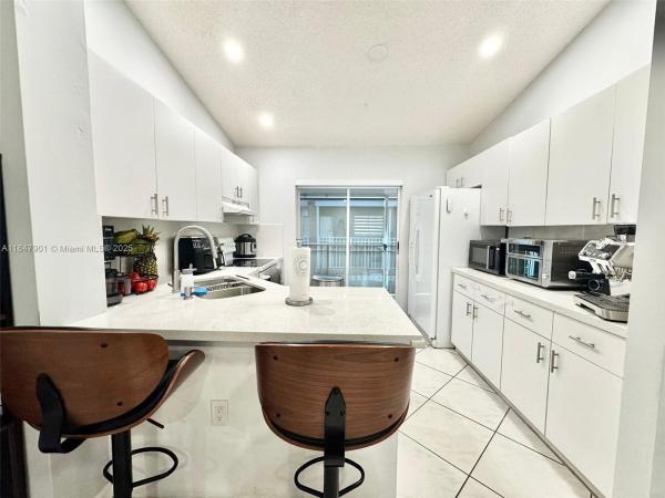 West Palm Villas, 2527 W 76th St #212, Hialeah, Florida 33016, image 1