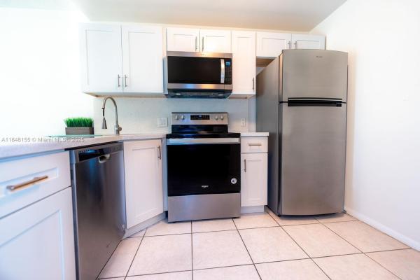 Rem Foster & Sanchez Trac, 2345 NE 135th St #307, North Miami, Florida 33181, image 1