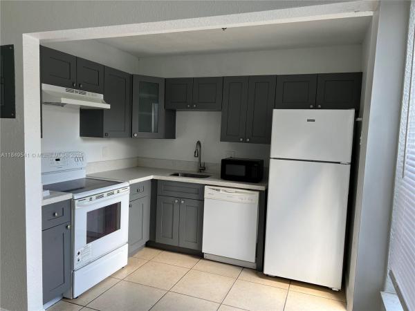 Townhouses Of Plantation, 4705 NW 9th Dr #4705, Plantation, Florida 33317, image 1