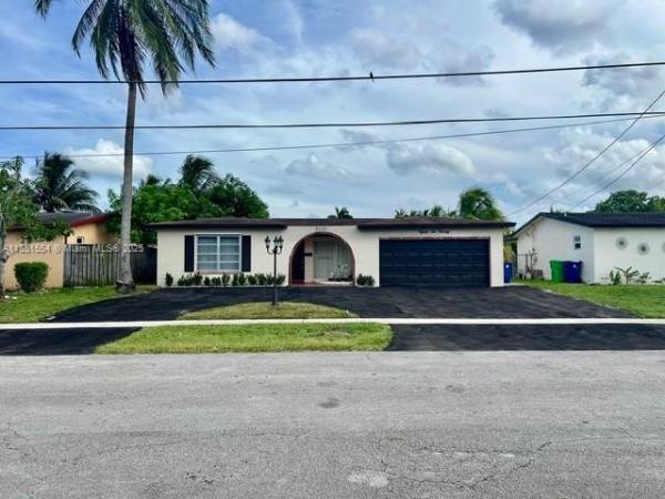 Sunrise Golf Village, 8620 NW 21st Ct, Sunrise, Florida 33322, image 1