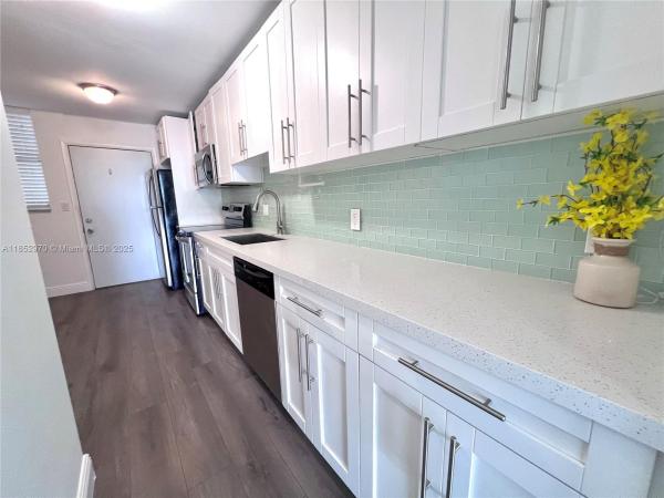 Eastern Shores White House, 3660 NE 166 St 409, North Miami Beach, Florida 33160, image 1