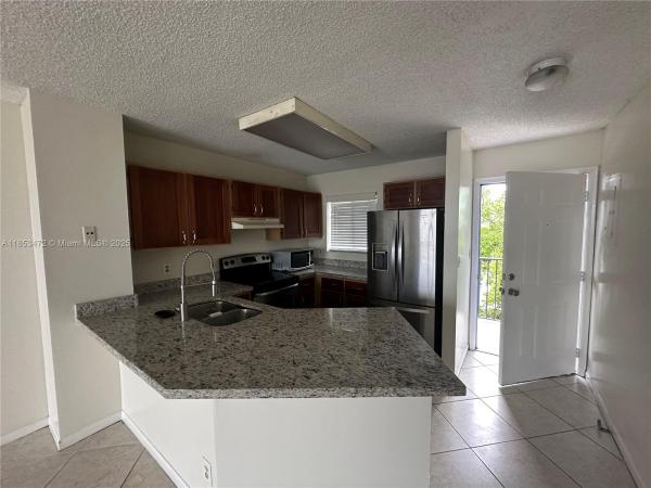 Lakeshore At University Park, 8710 N Sherman Cir #503, Miramar, Florida 33025, image 1