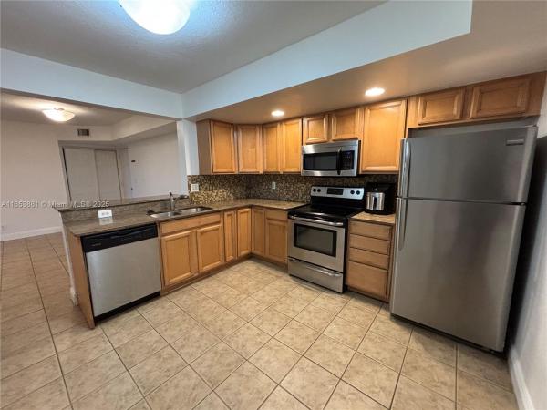 The Grand Oasis, 5761 Riverside Dr #105B4, Coral Springs, Florida 33067, image 1