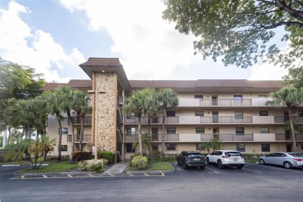 Lakes Of Carriage Hills, 4965 E Sabal Palm Blvd #303, Tamarac, Florida 33319, image 1