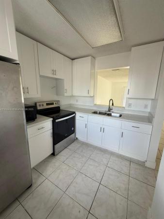 Lakeshore At University Park, 8700 N Sherman Cir #108, Miramar, Florida 33025, image 1