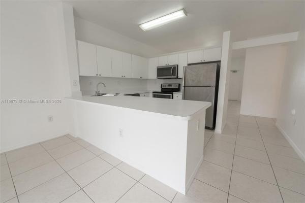 6930 NW 179th St #407-8, Hialeah, Florida 33015, image 1