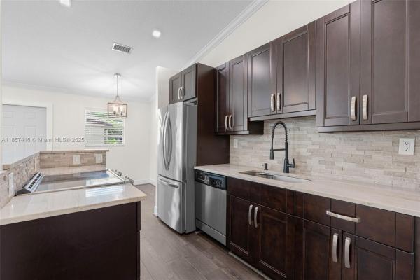 Villager Townhomes, 721 NW 47th St, Deerfield Beach, Florida 33064, image 2