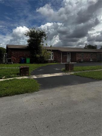 Sunrise Golf Village, 9661 NW 19th Pl, Sunrise, Florida 33322, image 1