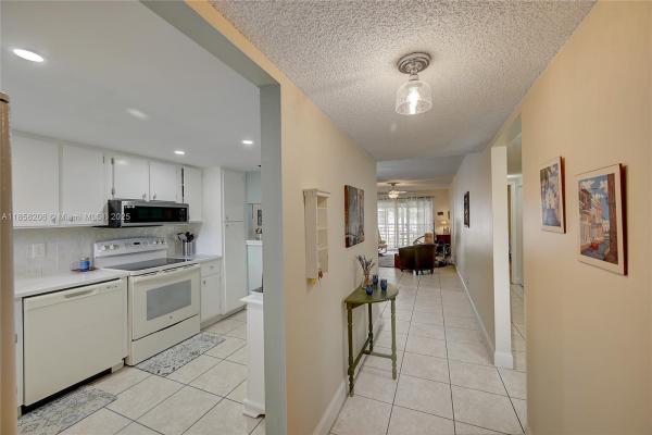 Ashton At Spring Lakes, 3186 Via Poinciana #203, Lake Worth Beach, Florida 33467, image 1