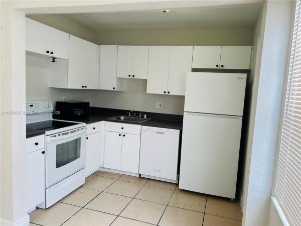 Townhouses Of Plantation, 4605 NW 9th Dr #4605, Plantation, Florida 33317, image 1