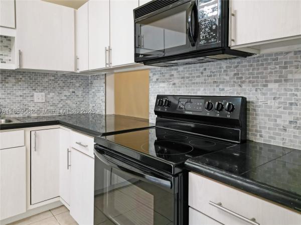 Villas At Carriage Hills, 114 Essex Rd #1-36, Hollywood, Florida 33024, image 2