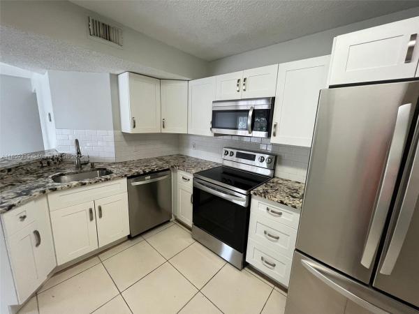 Edgewater, 8821 Wiles Rd #203, Coral Springs, Florida 33067, image 1