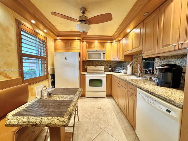 Meadowbrook Lakes View, 200 SE 5th Ave #106, Dania Beach, Florida 33004, image 1
