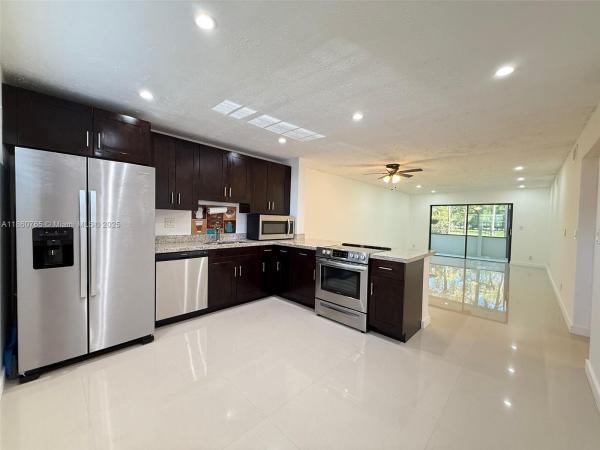 Lakes Of Carriage Hills, 6095 N Sabal Palm Blvd #103, Tamarac, Florida 33319, image 1