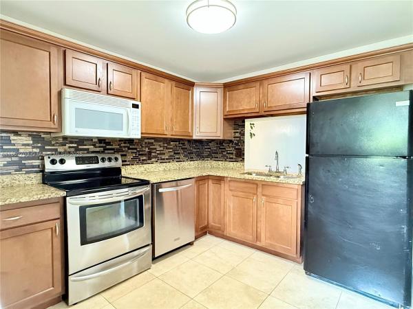 Berkeley Manor, 5495 NW 10th Ct #104, Plantation, Florida 33313, image 1
