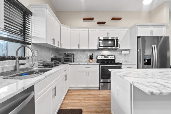 Deerlake Townhomes, 9265 NW 16th St #9265, Pembroke Pines, Florida 33024, image 1
