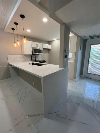 Elderberry Gardens, 5102 NW 36th St #605, Lauderdale Lakes, Florida 33319, image 1