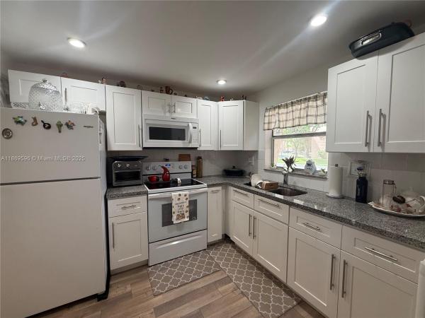 Sunrise Lakes 3, 9581 Sunrise Lakes Blvd #101, Sunrise, Florida 33322, image 1