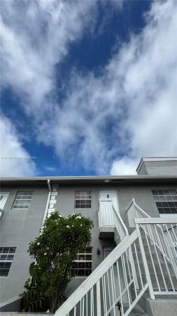 Monterey Village, 438 NE 210th Cir Ter #204-4B, Ives Estates, Florida 33179, image 1