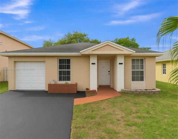 Villas At Woodland Greens, 5904 Woodland Point Pl, Tamarac, Florida 33319, image 1