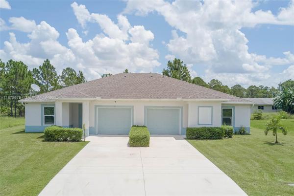 849/851 Bedford Dr., Lehigh Acres, Florida 33974, image 1