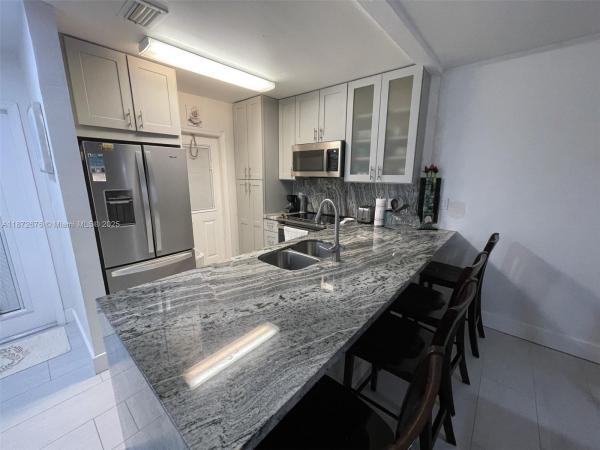 Dogwood Gardens, 5103 NW 35th St #402, Lauderdale Lakes, Florida 33319, image 1