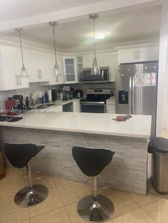 Coral Gate West, 6990 NW 186th St #4-409, Country Club, Florida 33015, image 3