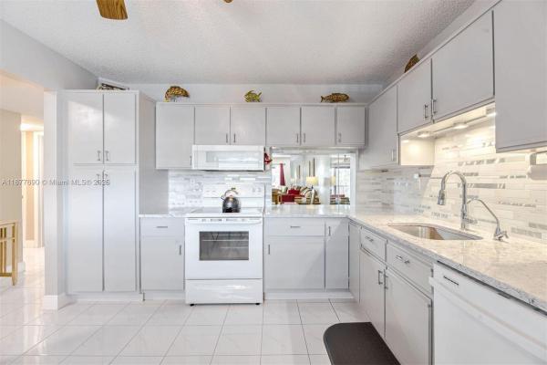 Lakes Of Carriage Hills, 4955 E Sabal Palm Blvd 305 ##305, Tamarac, Florida 33319, image 1