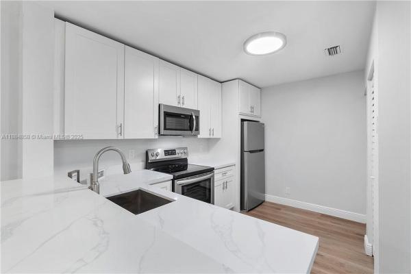 The Grand Oasis, 5861 Riverside Dr #205A2, Coral Springs, Florida 33067, image 1