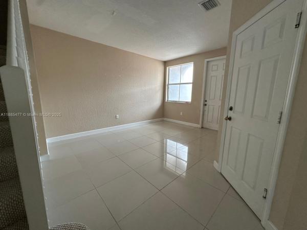 Ives Dairy Townhomes, 1026 NE 207th Ter, Ives Estates, Florida 33179, image 2