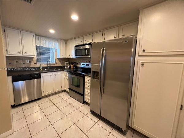 Rolling Hills Golf And Tennis Club, 3150 W Rolling Hills Cir #202, Davie, Florida 33328, image 1
