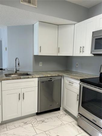 Edgewater, 8801 Wiles Rd #306, Coral Springs, Florida 33067, image 1