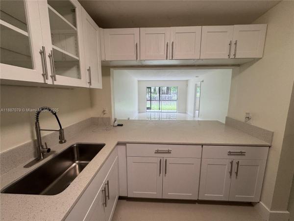 Versailles Gardens, 7925 Fairview Dr #102, Tamarac, Florida 33321, image 1