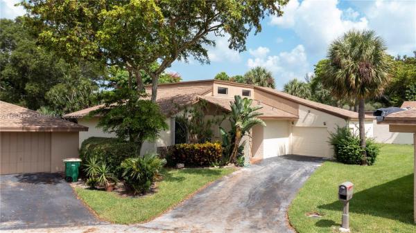 Villas At Woodmont, Tamarac, Florida 33321, image 1