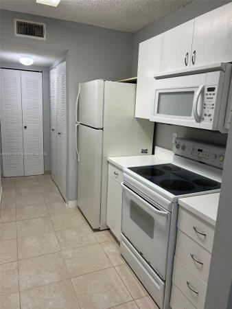 10521 SW 158 Ct #102, Unincorporated Dade County, Florida 33196, image 1