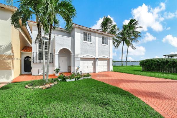 Precious Homes At Twin Lakes, 13649 SW 142nd Ter, Three Lakes, Florida 33186, image 2