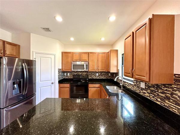 Champion Lakes, 404 NE 194th Ter, Ives Estates, Florida 33179, image 2