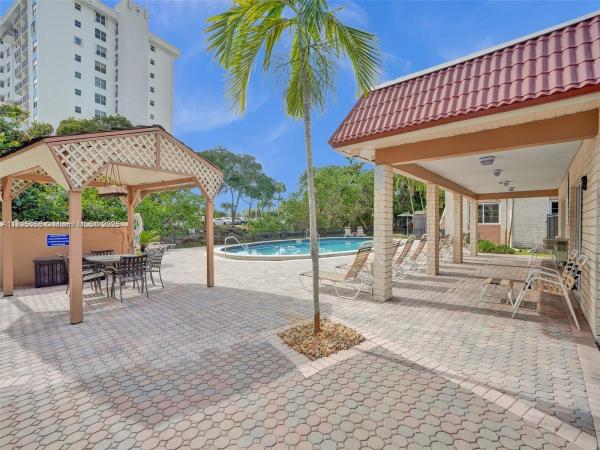 Manor Grove Village, 90 NE 19th Ct, Wilton Manors, Florida 33305, image 1