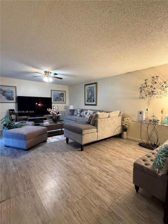 Willow Wood Townhomes, 7831 Tam Oshanter Blvd, North Lauderdale, Florida 33068, image 1