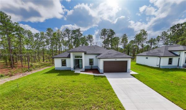 Lehigh Acres Residential, 932 Maddock St E, Lehigh Acres, Florida 33974, image 1