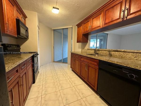 Le Chateau, 3100 N Pine Island Rd #310, Sunrise, Florida 33351, image 1
