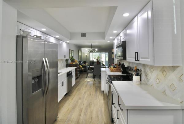 Cambridge At Century Village, 1200 SW 125th Ave #105L, Pembroke Pines, Florida 33027, image 1