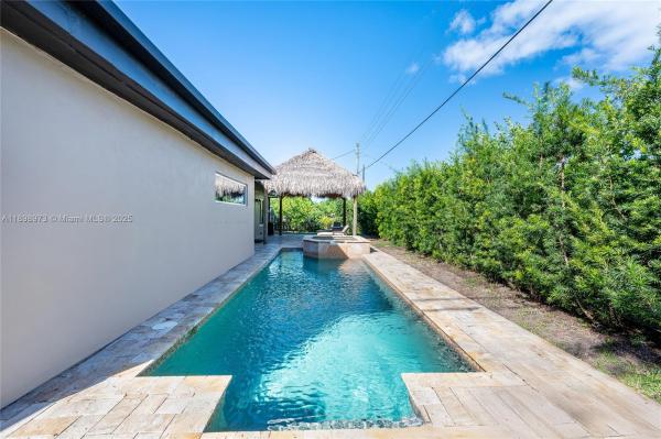 Heftler Homes, 10341 SW 52nd Ter, Westwood Lakes, Florida 33165, image 3