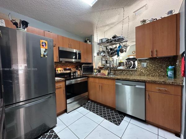 Adventure Homes, 14841 SW 141st Ter, Country Walk, Florida 33196, image 2