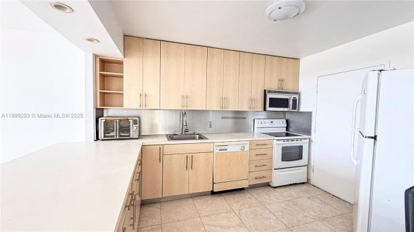 Buckley Towers East, 1351 NE Miami Gardens Dr #1423E, Ojus, Florida 33179, image 2